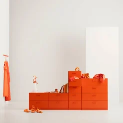 One low, one tall and one wide Relief drawer with plinth